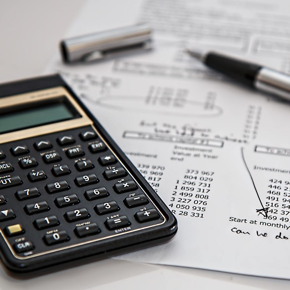 Calculator, on top of tax documents