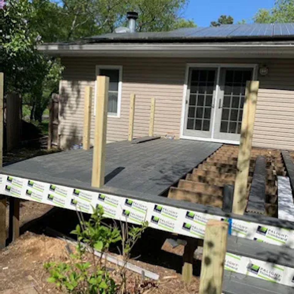 Backyard deck framing and construction in progress by general contractor in Suffolk County NY