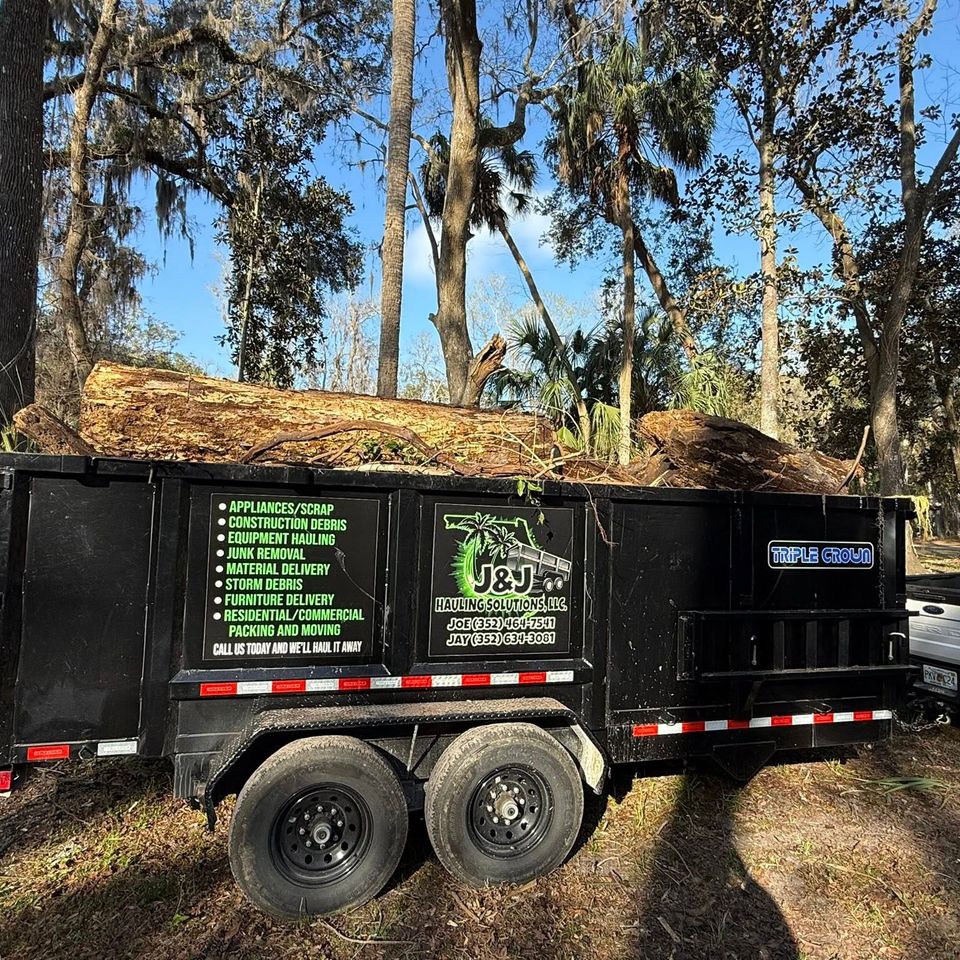 A full trailer of tree stumps, done by JNJ Hauling Solutions of Citrus County