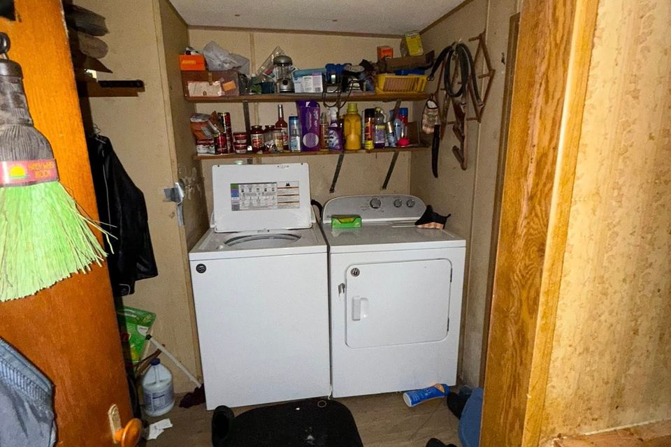 A washer and dryer getting prepared to be transported by JNJ Hauling Solutions of Citrus County