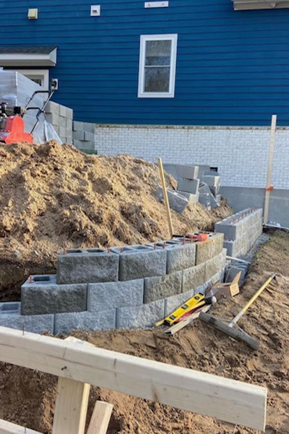 "Decorative breeze block retaining wall constructed by Gabino Landscaping in Myrtle Beach, South Carolina."