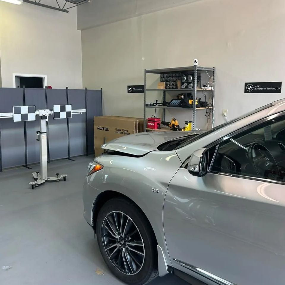 A car during the ADAS Calibration service in a shop