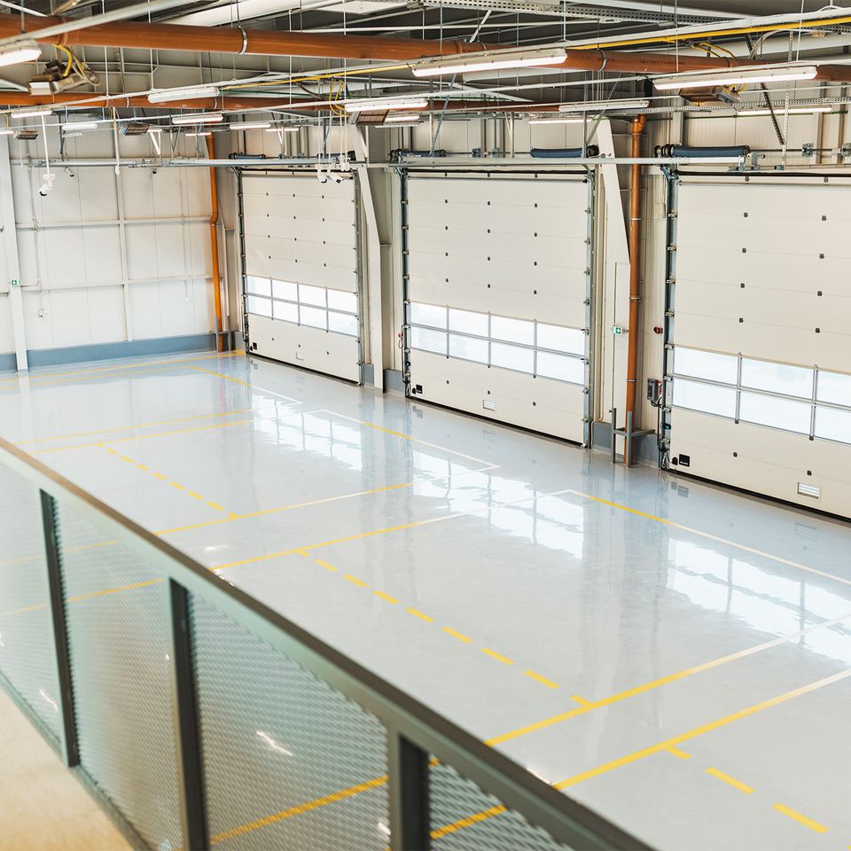Garage doors in a new car workshop 2023 11 27 05 11 14 utc brighter