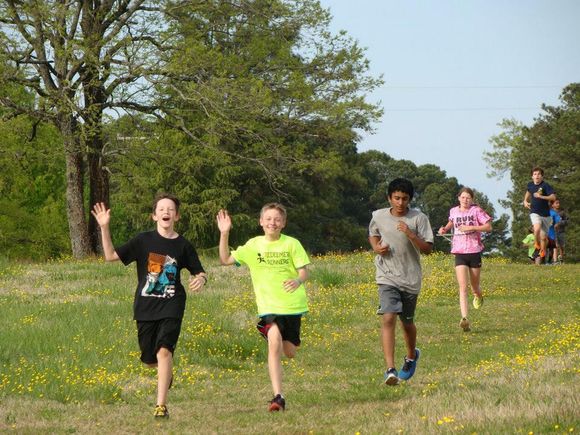 Grk running with flowers