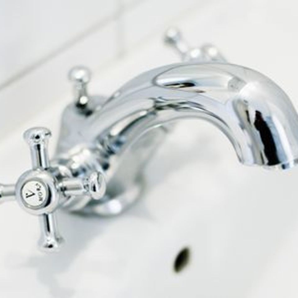 Close up of shiny faucet 161135677 588d19b95f9b5874ee161f92