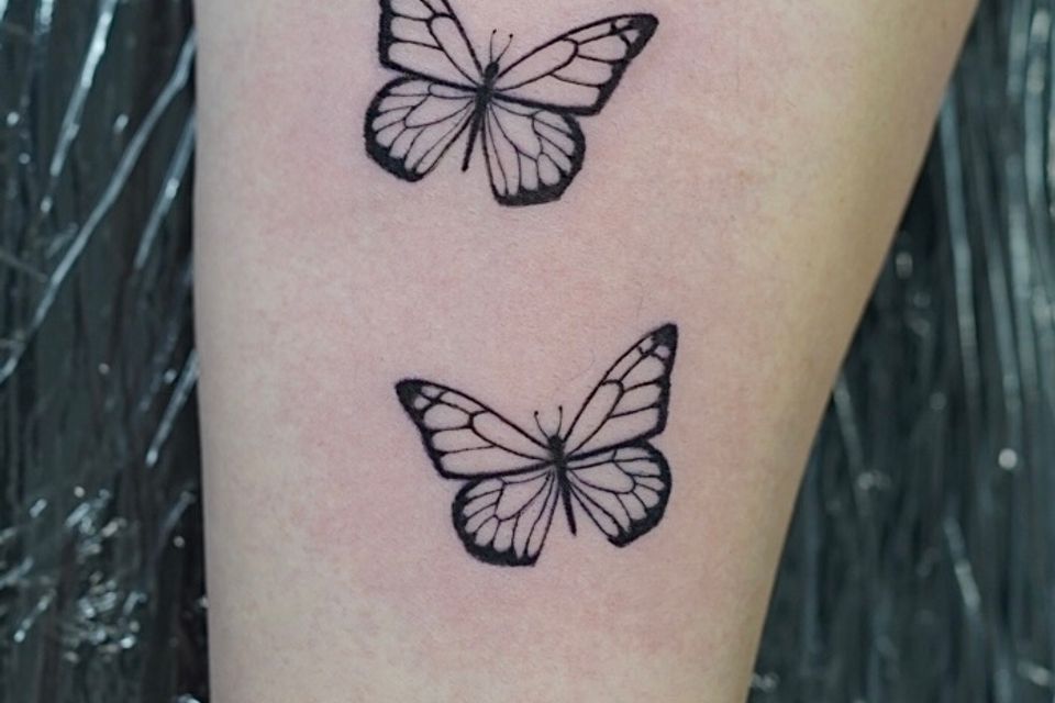 Image of 2 butterflies in black ink and in excellent detail