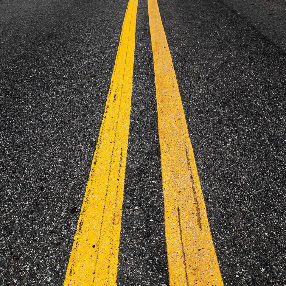 Bigstock yellow double dividing lines p 264791032