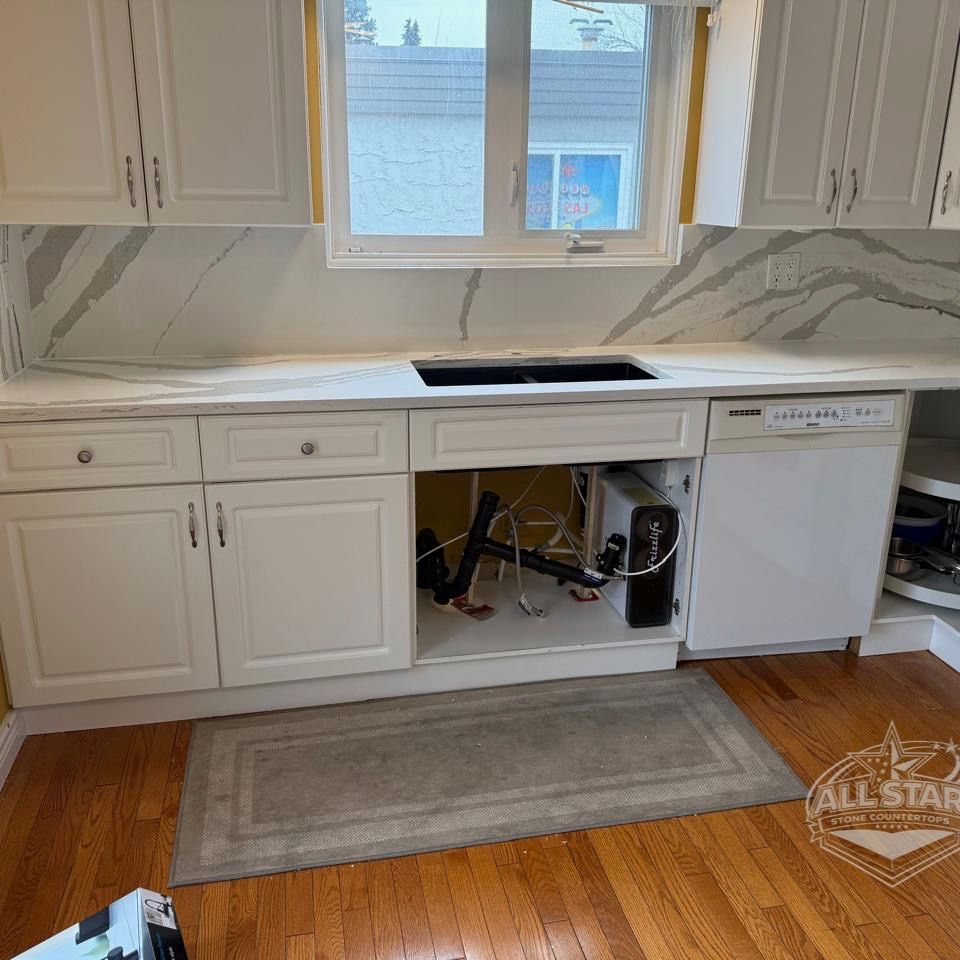 White kitchen countertops with custom backsplash installation in Houston, TX