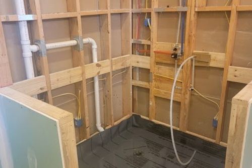 Plumbing and pan liner installed for custom corner shower in The Woodlands, TX