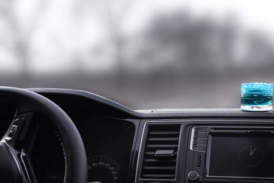 Vehicle dashboard and interior representing professional automotive electrical repair services.