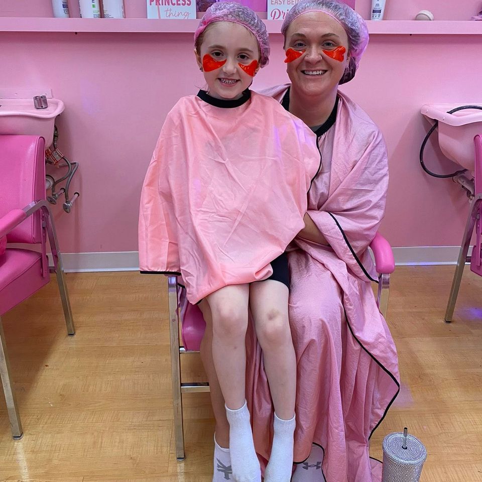 Child enjoying a facial at The Princess Parlor
