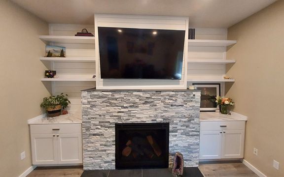 Downstairs fireplace and tv 8x5