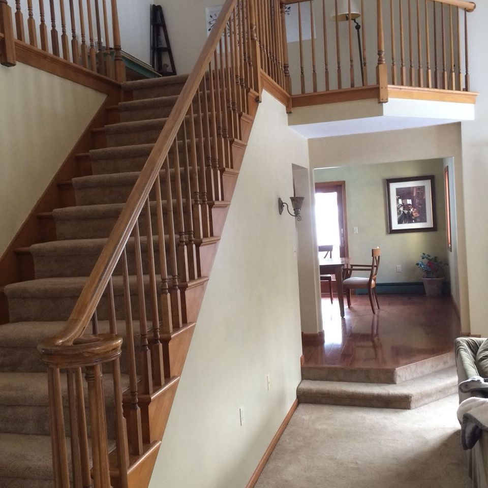 Staircase landing wood railing