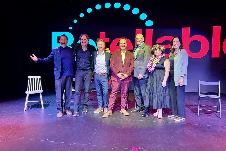 Group of people standing on a stage