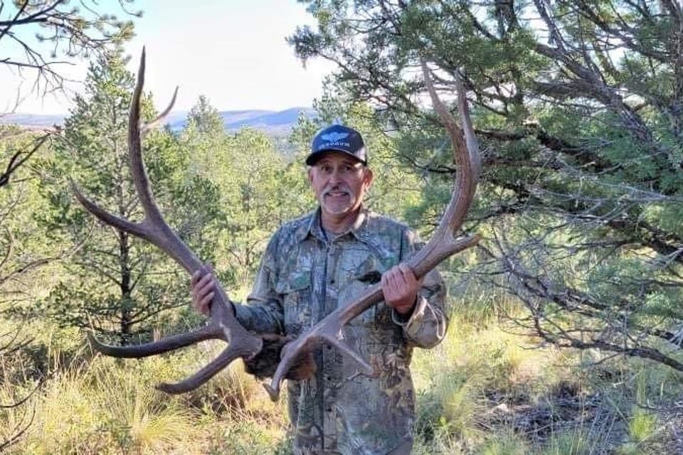 Mi hunter jesse with his trophy bull 2021
