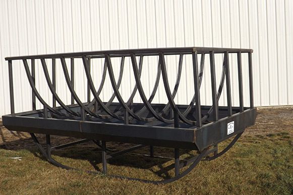 Double horse balefeeder