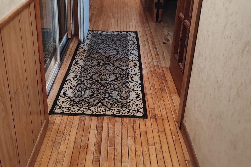 Refinishing flooring in hallway
