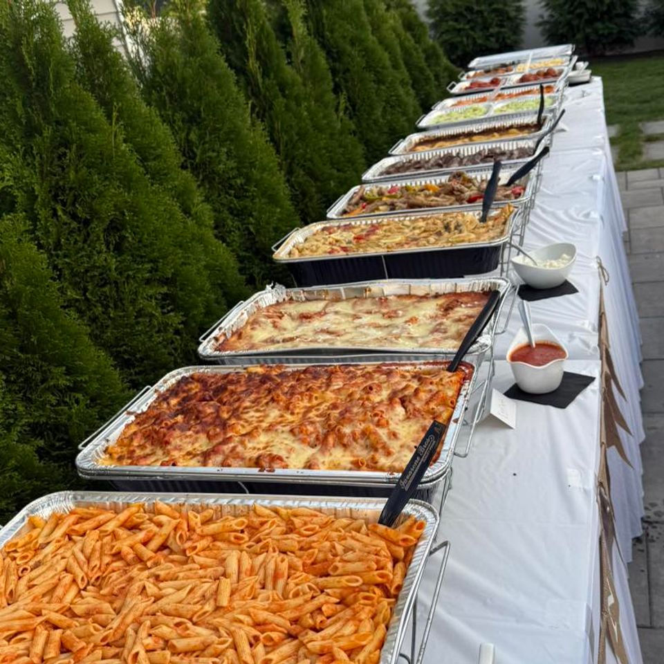 alt="The Party Savers staff bartending and waitressing at a Long Island Engagement Party"