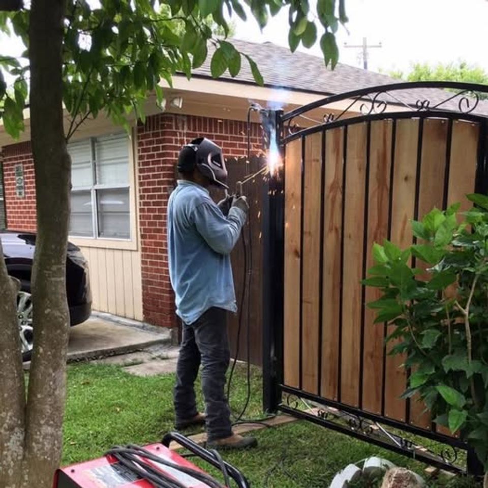 Custom iron fence and gate installed by Marquez Welding in Houston TX