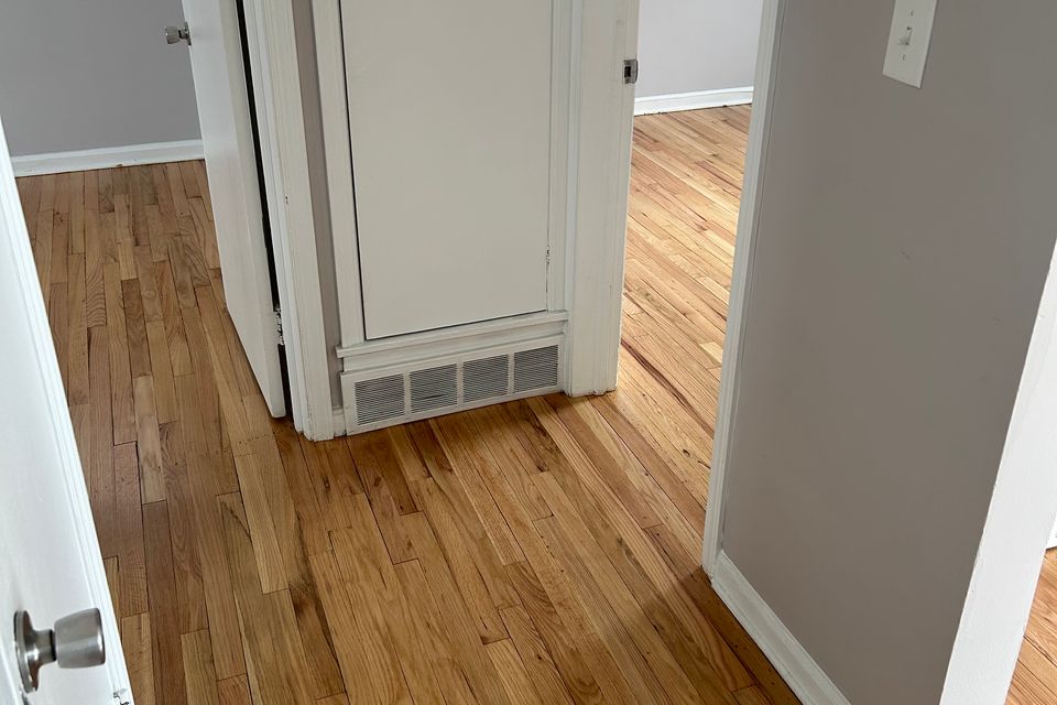 Hardwood flooring job, showing multiple rooms with the finished work, done by Siti Floors of Northeast Ohio