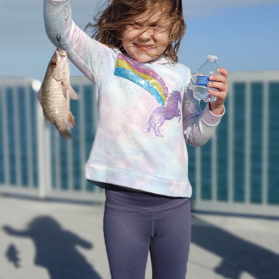 Little girl with fish