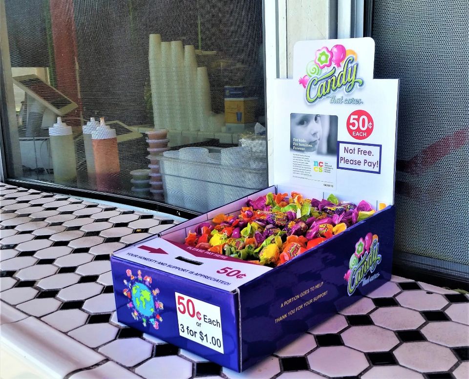 Honor box shown on counter top where customers place orders