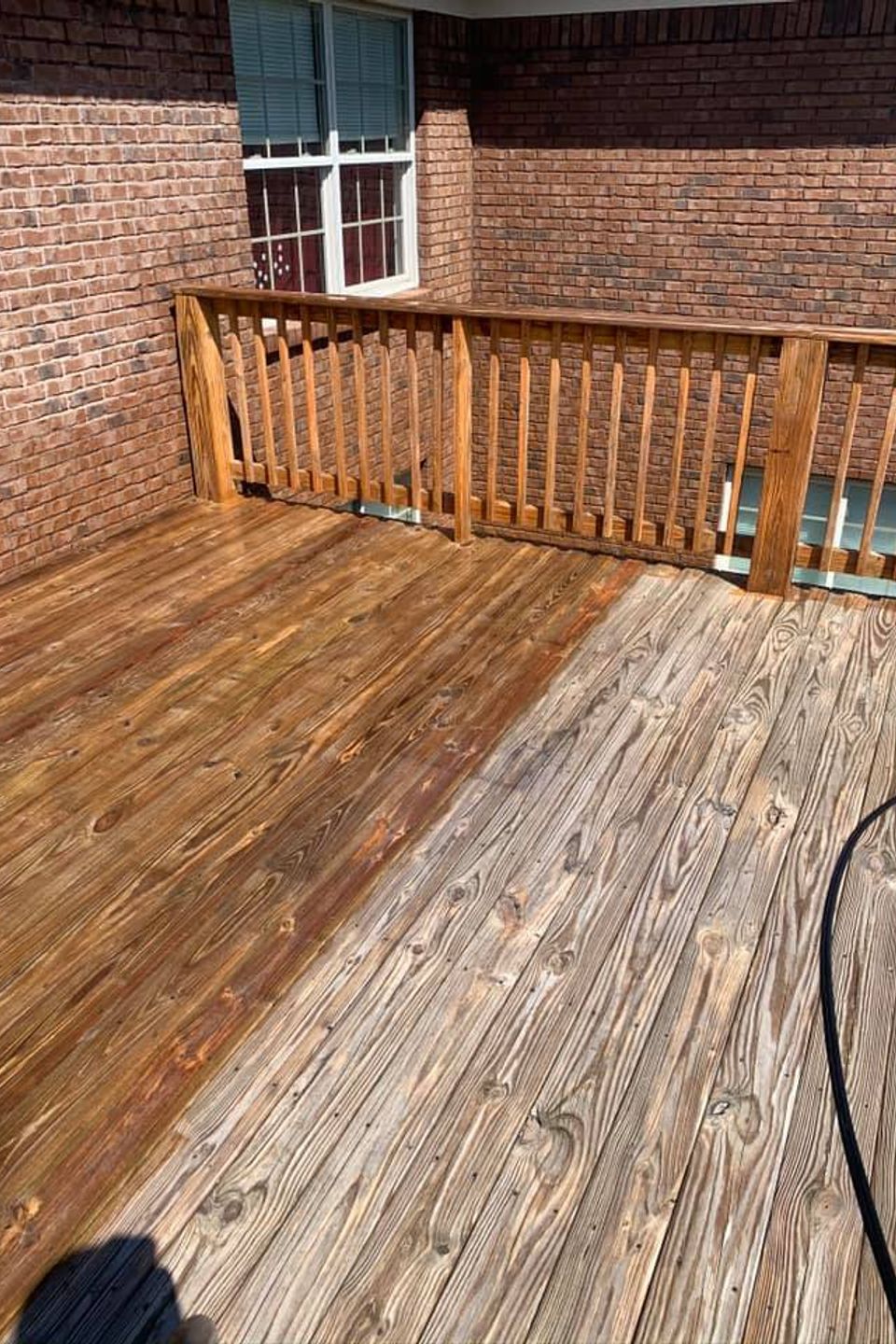 Wood deck pressure washing and restoration by TLC Pressure Washing