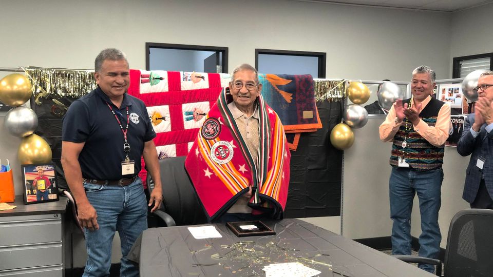 Custom embroidered ceremonial blanket created by SaRi’s Creations for Mr. Floyd Poncho at a special reception event