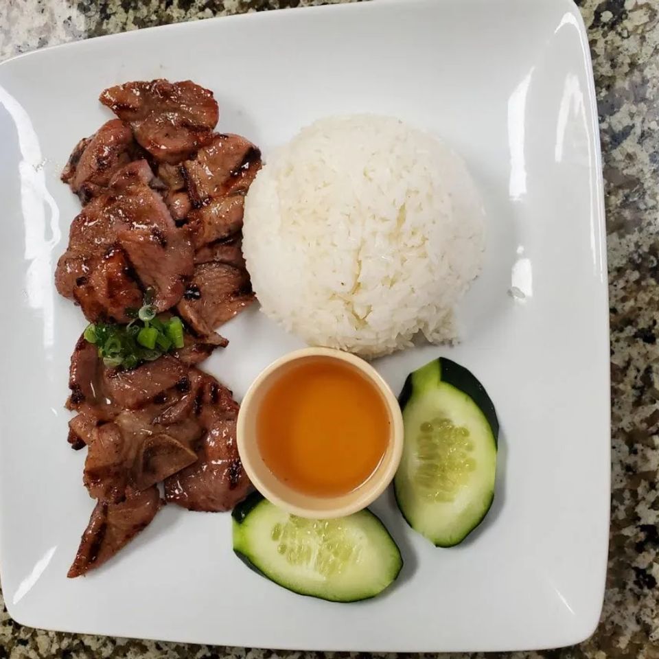  63 grilled pork chop or grilled pork over steam rice