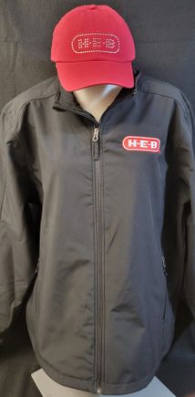 Embroidery Example - HEB logo on gray windbreaker, rhinestone bling HEB logo on red cap. 