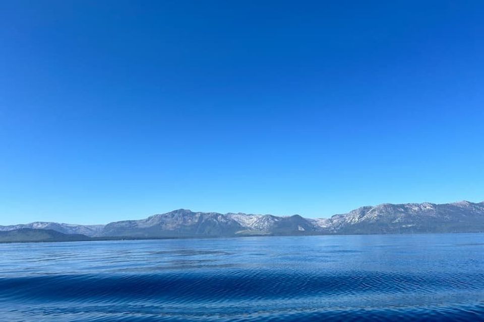 Photo from KPCopy's boat "Believe" of the still water with Mt Tallac in the background 
