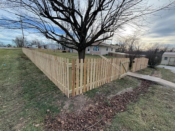 Picket fence with gate for sidewalk bridge