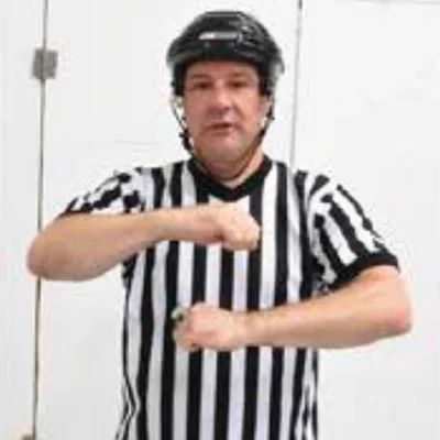 Referee charging signal.jpg