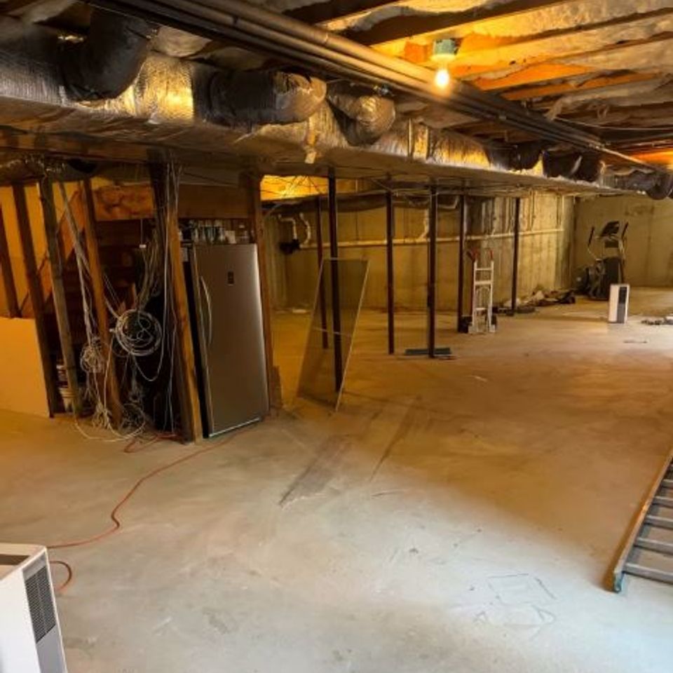 A basement remodeling job in progress by Taurus Contracting Inc