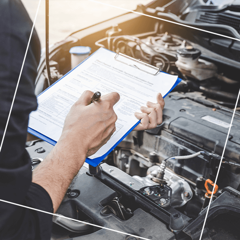 Mechanic writing bill for repairs