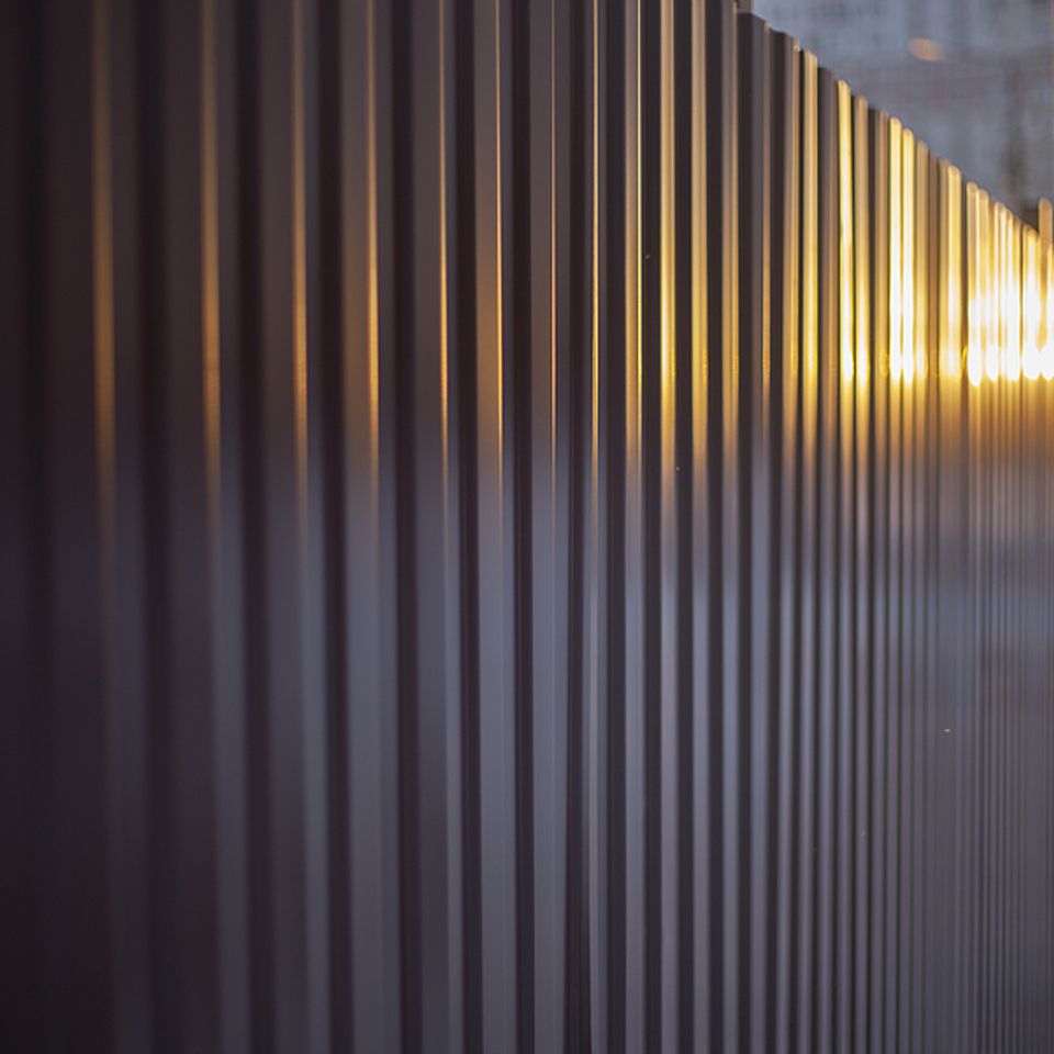 Bigstock metal fence around the buildin 360726271