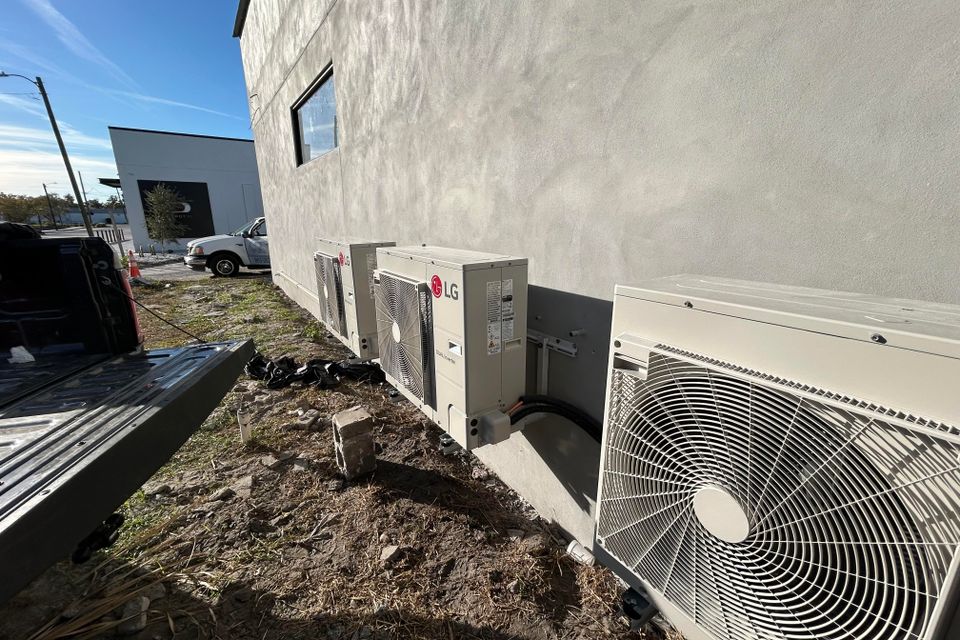 Exterior view of a building that has several LG Split Unit air conditioners installed by Angel's Air