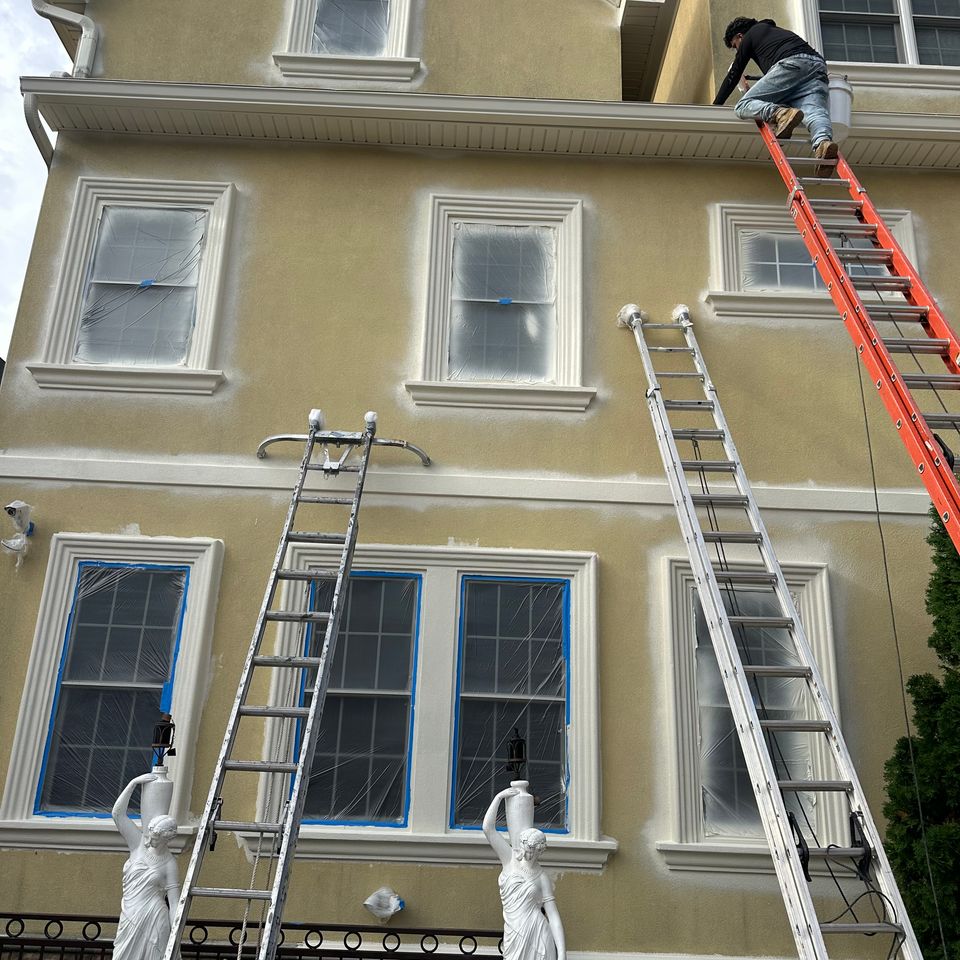 Careful surface prep of a private home before exterior painting