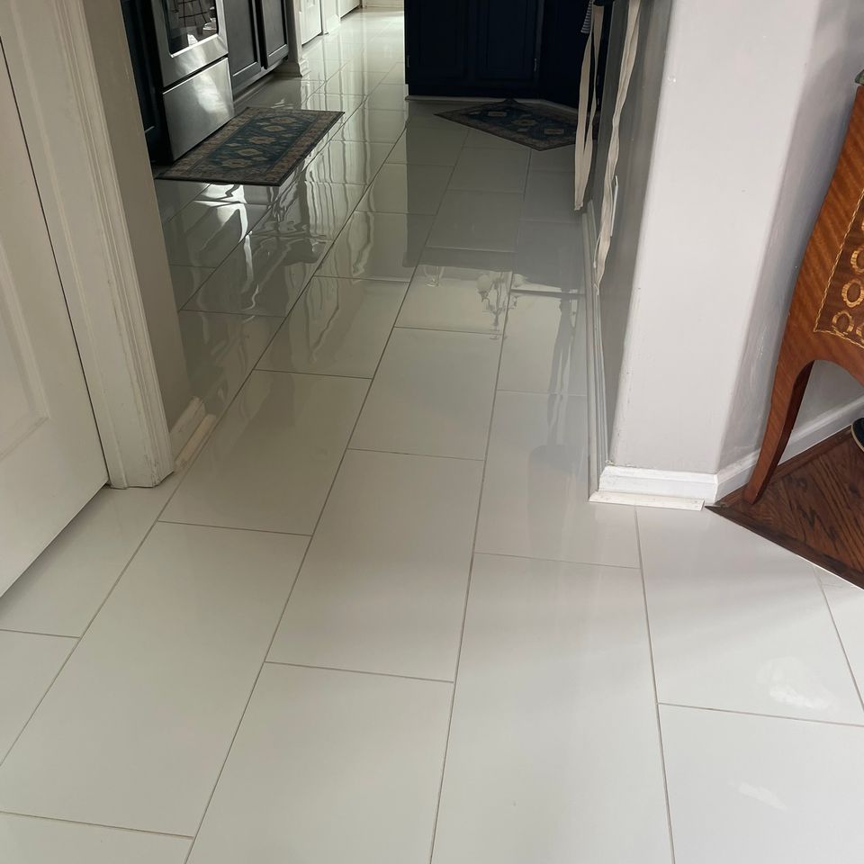 Glossy white tile floor after house cleaning service in Virginia Beach VA