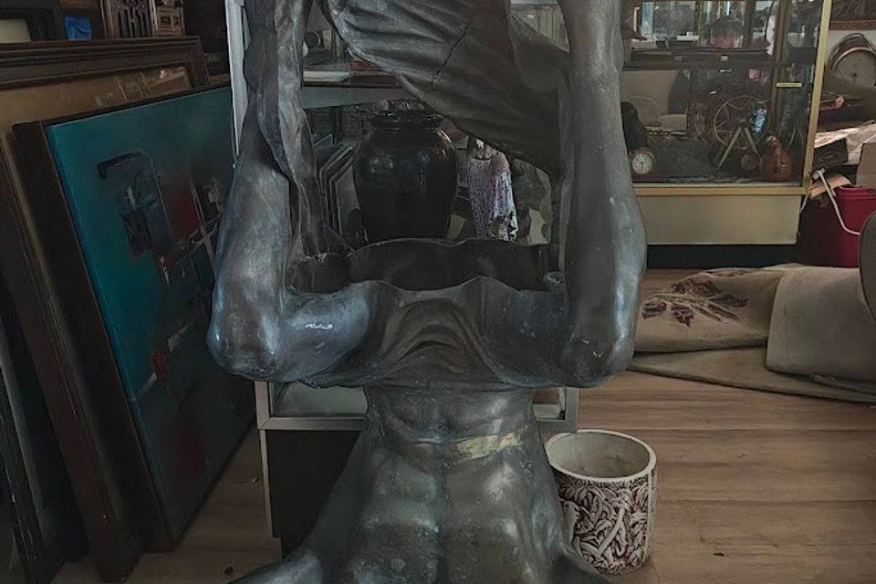 Upside down man statue