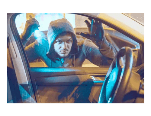 Robber peering inside driver side window of car