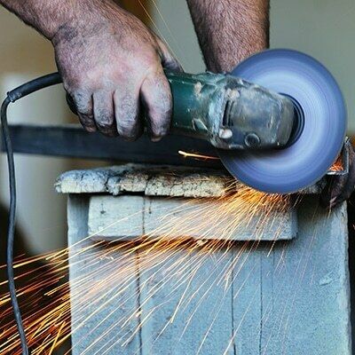 Power tool drilling sparks featured