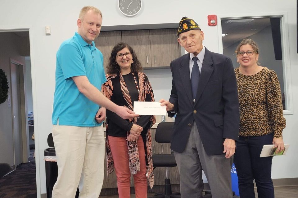 Cory noel  vice president  presenting to the veterans