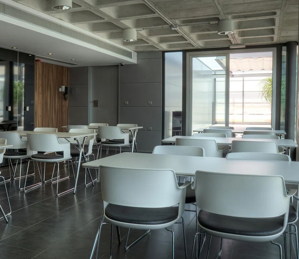 Corporate cafeteria cleaning, breakroom sanitization, and office common area janitorial services.