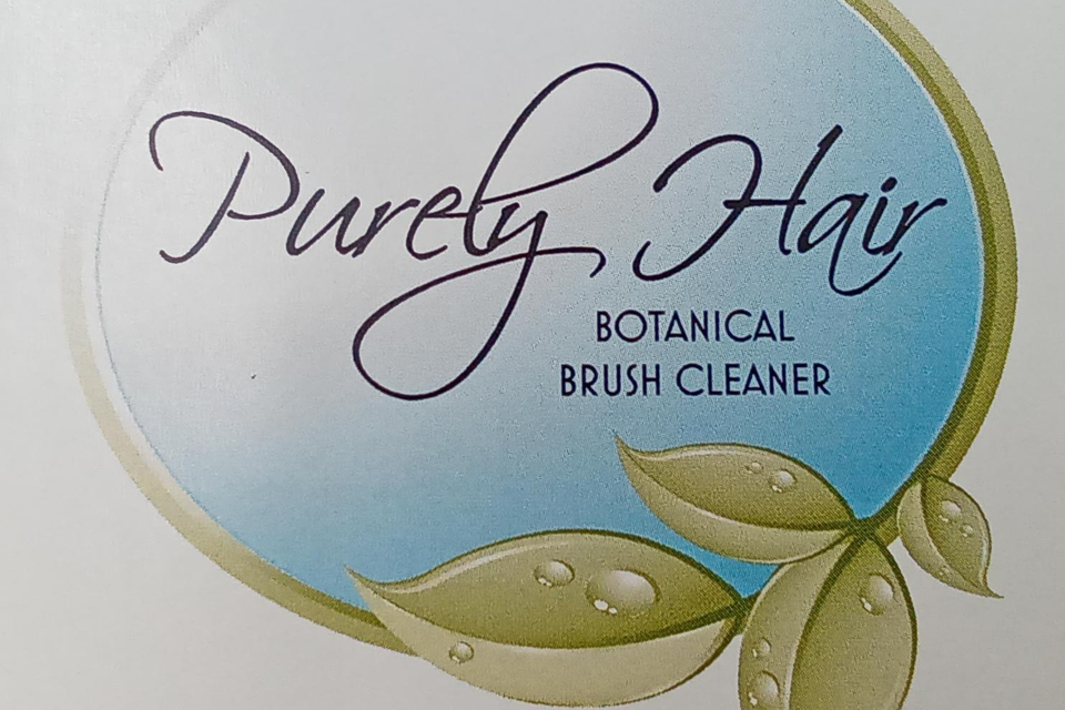 Purely hair brush cleaner logo