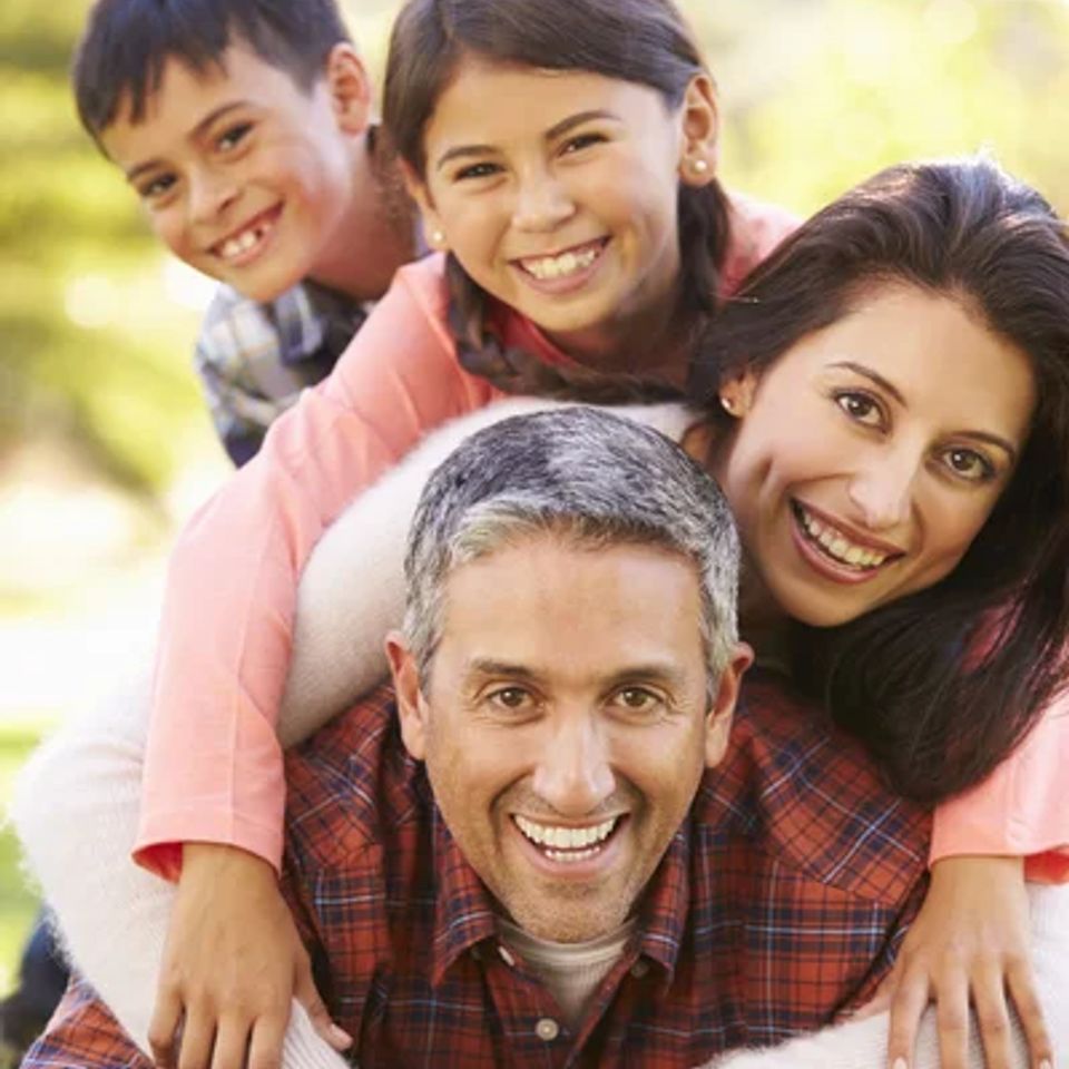 Depositphotos 48459903 stock photo portrait of family lying on