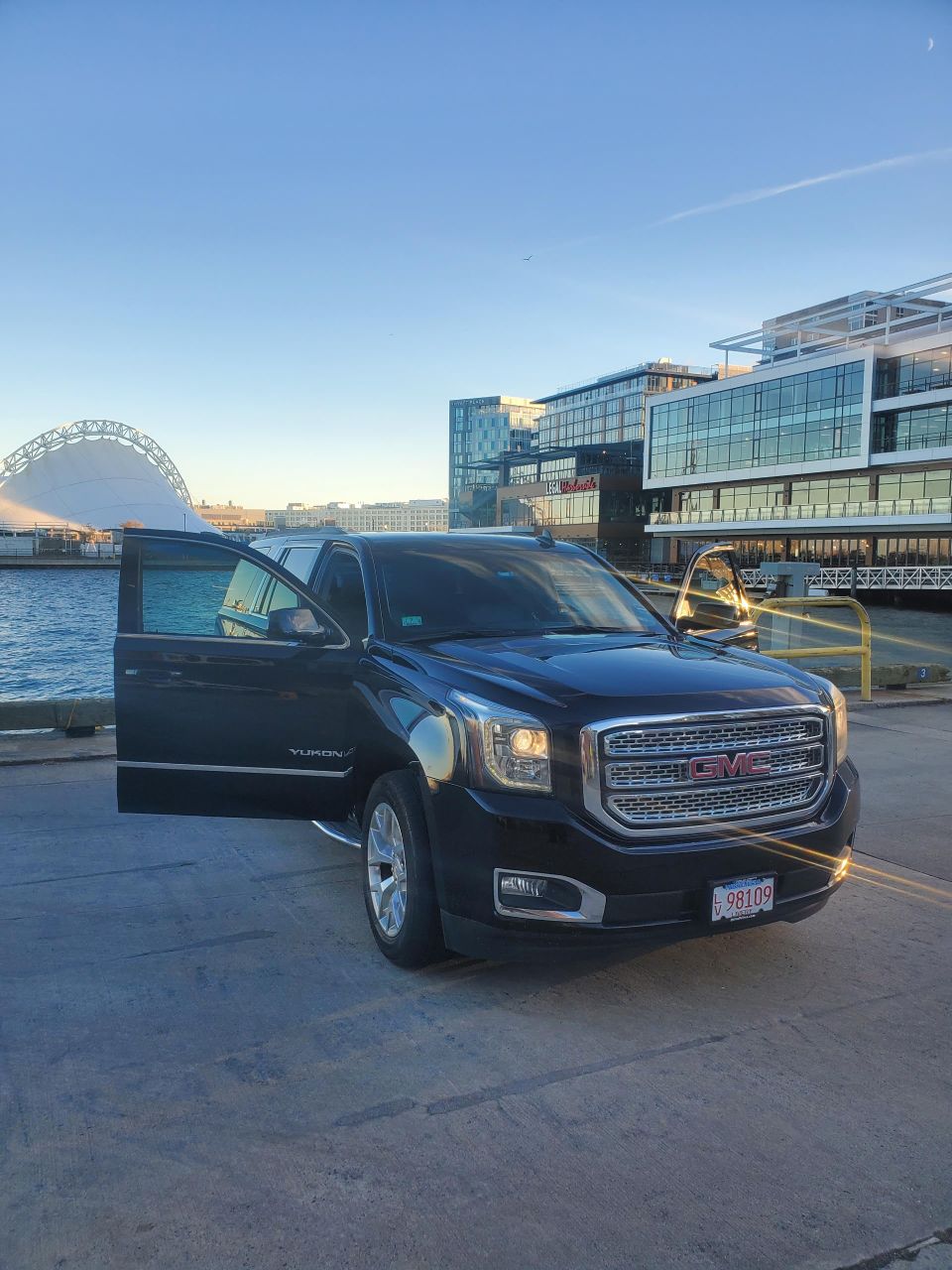 Pinnacle heights gmc yukon xl slight side doors open boston backdrop