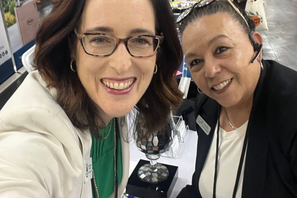 Two women smiling