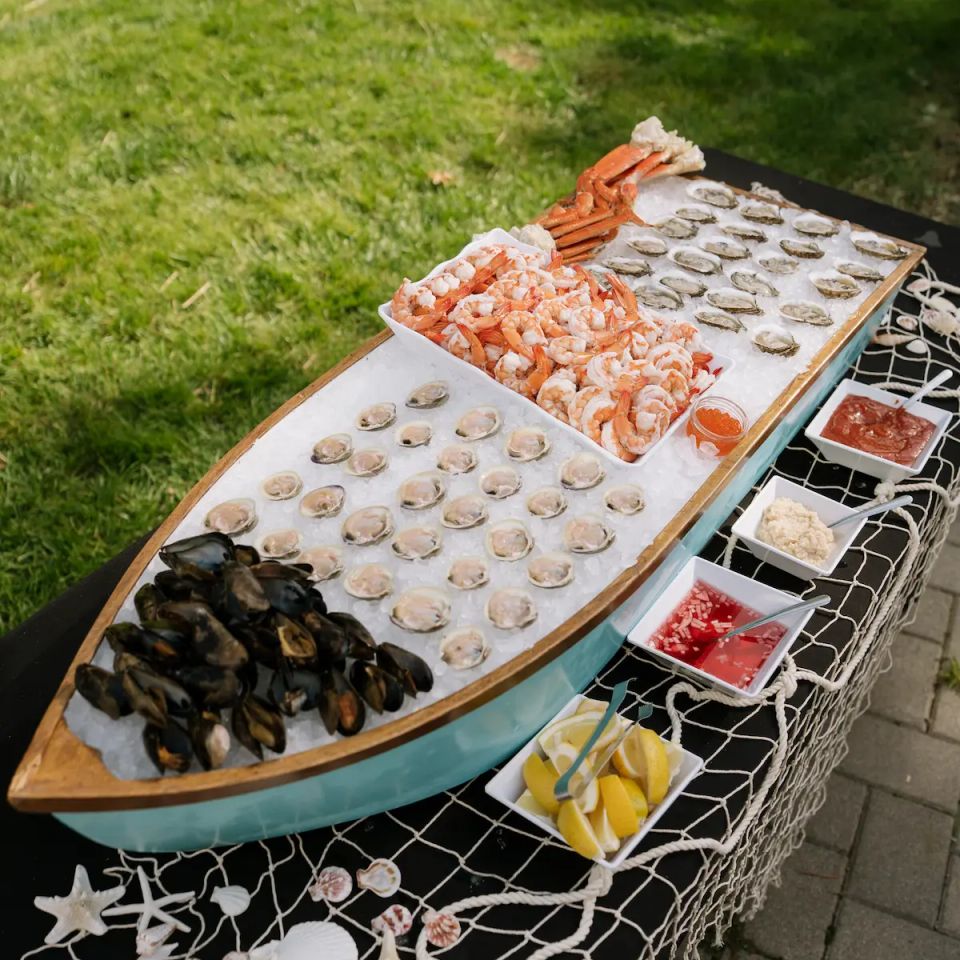 Seafood on ice, set up for event, by Shore2Shore Shucking on Long Island