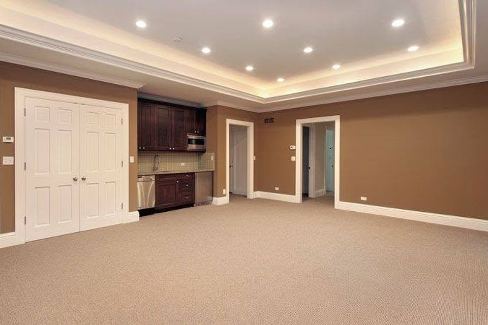 Finished basement carpet built in cabinets